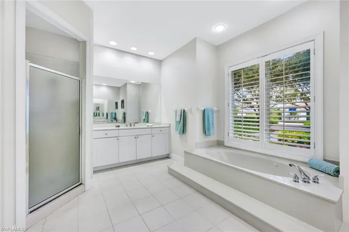 Soaking Tub and Walk-In Shower in Primary Bath