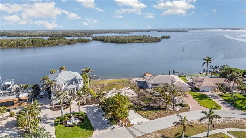 Aerial View of oversized (.35 acre) Bay Front Residential lot ready for a new Coastal Home with a View!