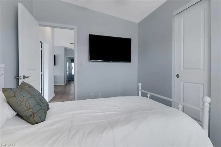 Bedroom with wood finished floors