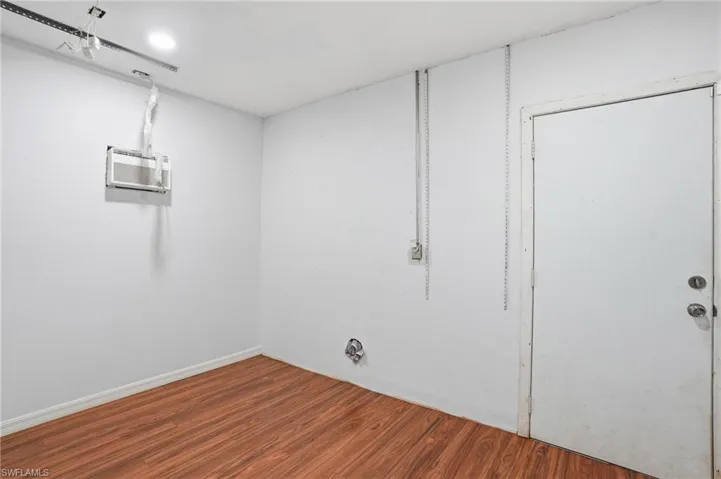 Basement with wood finished floors
