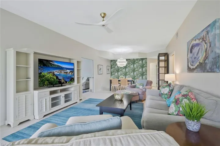 Living room featuring ceiling fan
