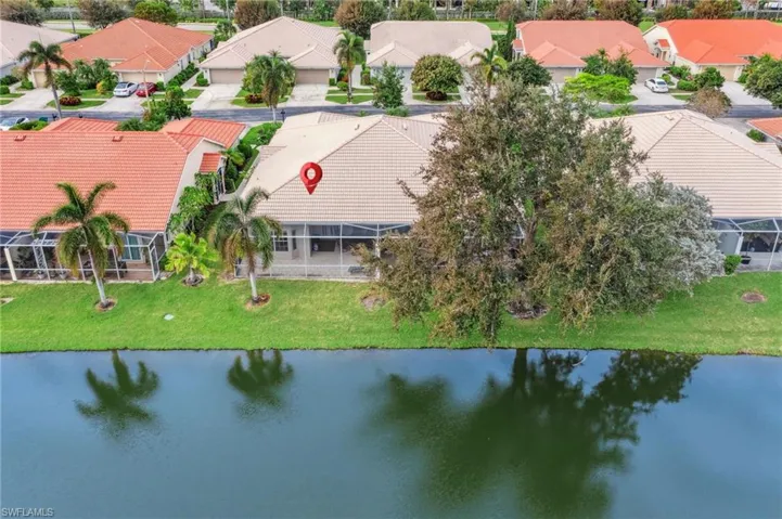 Bird's eye view part of the villa and a lake view