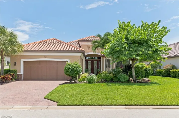 Mediterranean-inspired exterior with a terracotta tile roof