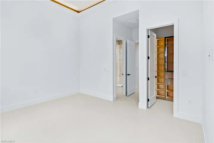SUITE 2 - All bedrooms w/ ELEGANT TRAY CEILINGS w/ WOOD INLAY ACCENTS