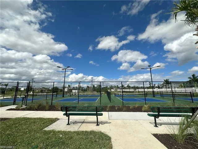 Surrounding community with a tennis court