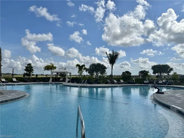 Community pool featuring a gazebo and a patio area