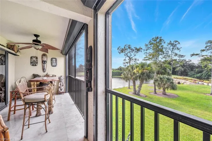 Sunroom featuring ceiling fan