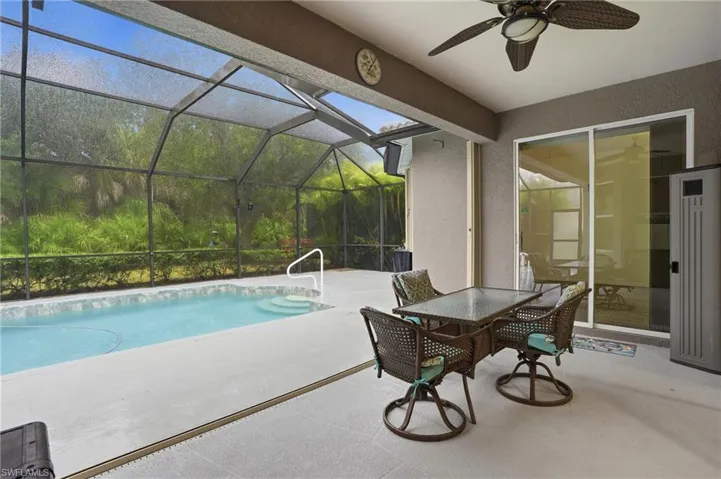 Lanai with ceiling fan and outdoor dining area