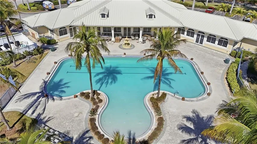 Community pool featuring a patio area and french doors