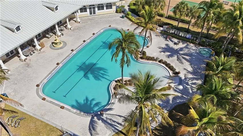 Community pool featuring a patio