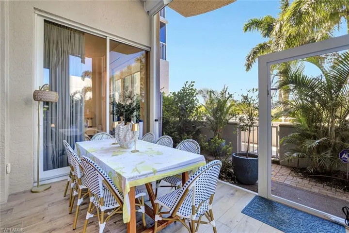 View of screened in lanai with private patio and private acces to the pool