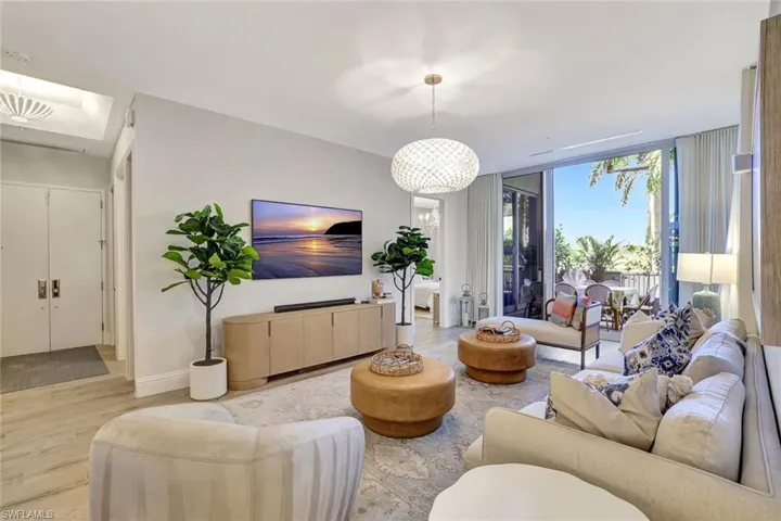 Living area featuring wood finished floors and expansive sliding doors