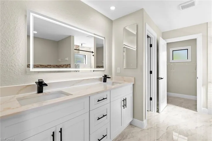 High Tech mirrors and faucets
