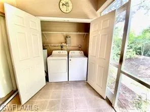 Laundry area with separate full sized washer and dryer