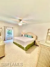 Primary Suite bedroom with King Bed and dressers in suite split floor plan