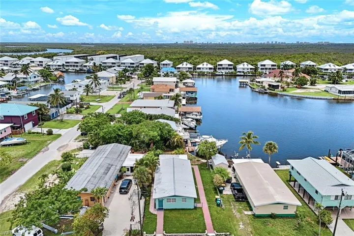 Aerial view of residential area with a nearby body of water