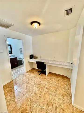 Home office with built in desk