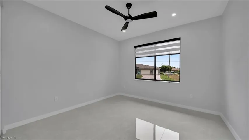 Spare room featuring ceiling fan and recessed lighting