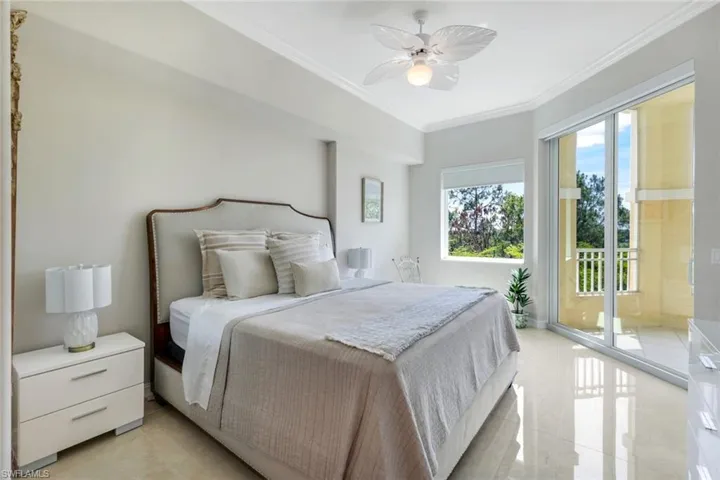 Bedroom with access to outside, crown molding, and ceiling fan