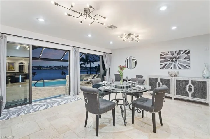 Dining area with an inviting chandelier