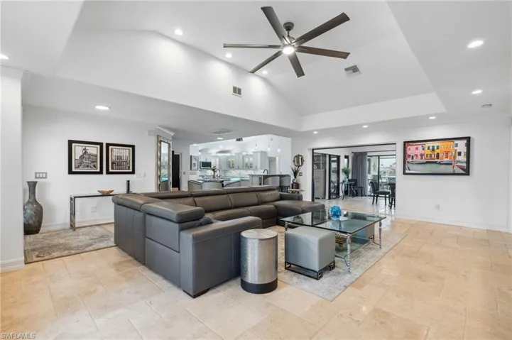 Living room featuring ceiling fan