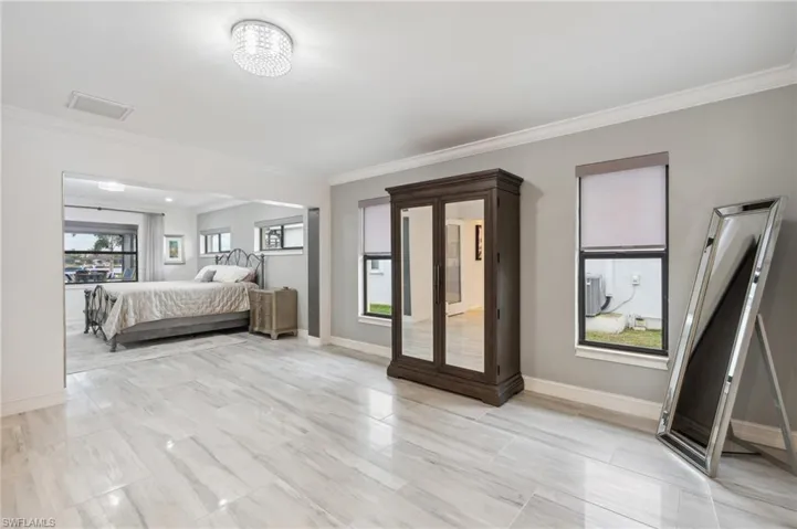 Bedroom with ornamental molding