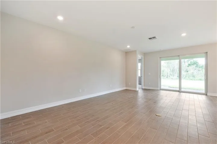 Spare room featuring light hardwood / wood-style floors
