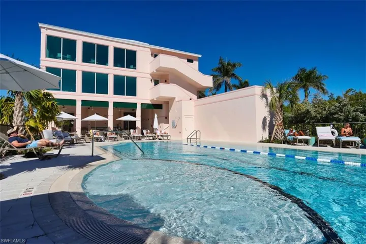 Community pool featuring a patio area