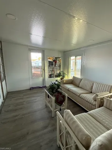 Living room featuring wood finished floors