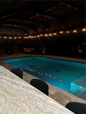 View of pool at night