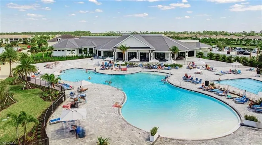 Community pool featuring a patio area