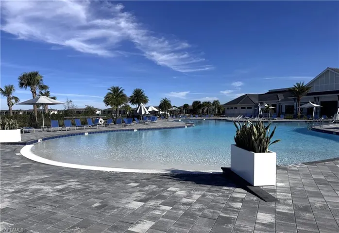 Community pool featuring a patio area