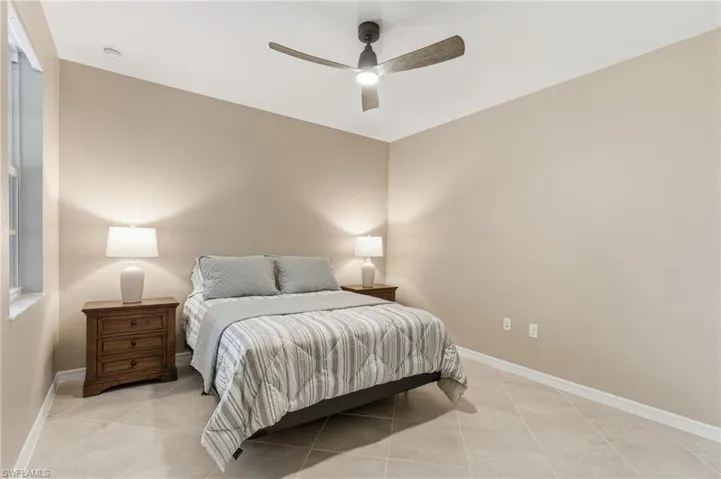 Bedroom featuring ceiling fan and light tile patterned floors