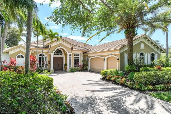 Extended paved driveway with 3 car garage