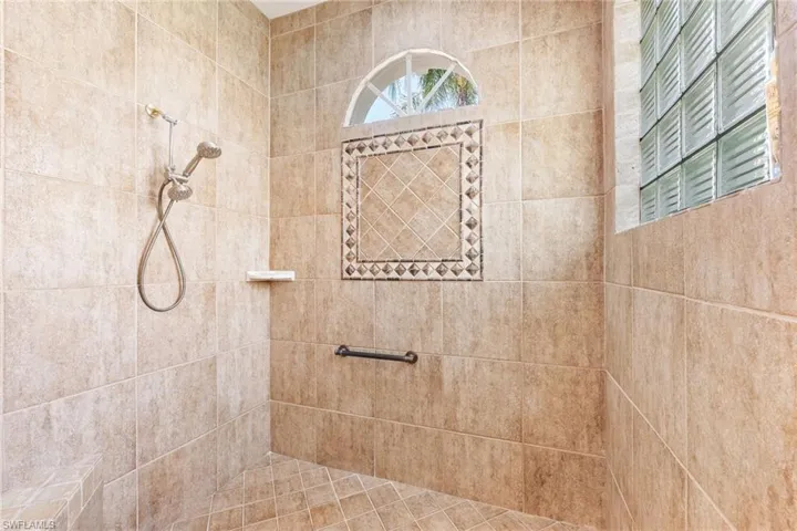 Huge walk-in shower in primary bathroom