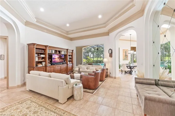 Living area with views to the pool & golf course