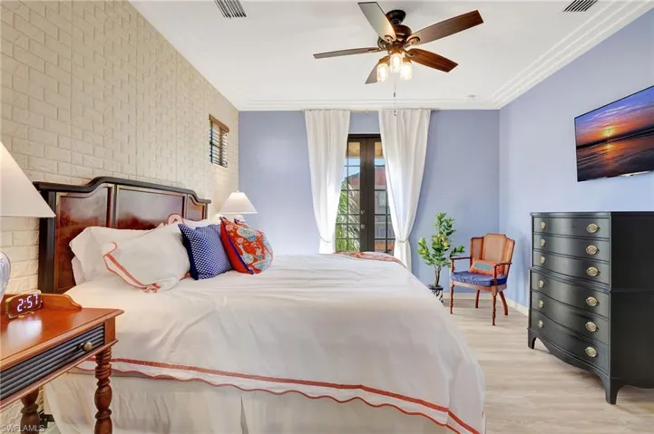 Primary bedroom with Juliet balcony