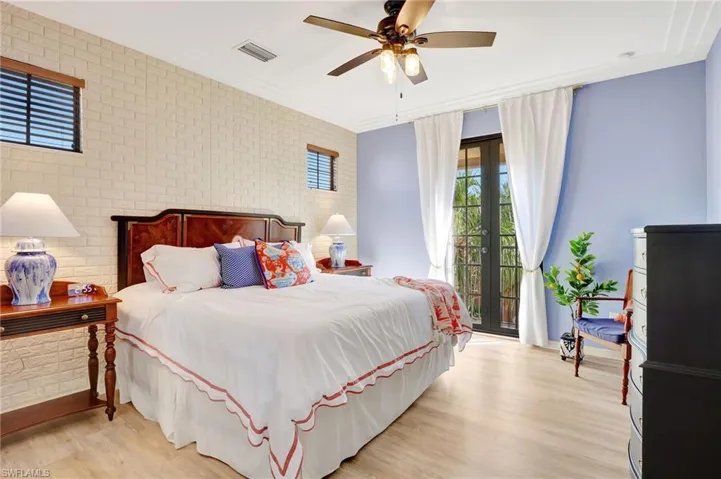 Primary bedroom with Juliet balcony