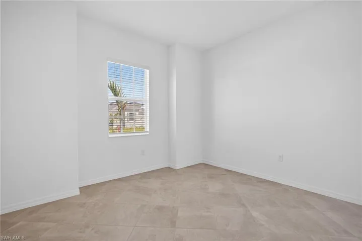 Bedroom with baseboards