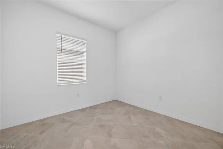 Bedroom with baseboards
