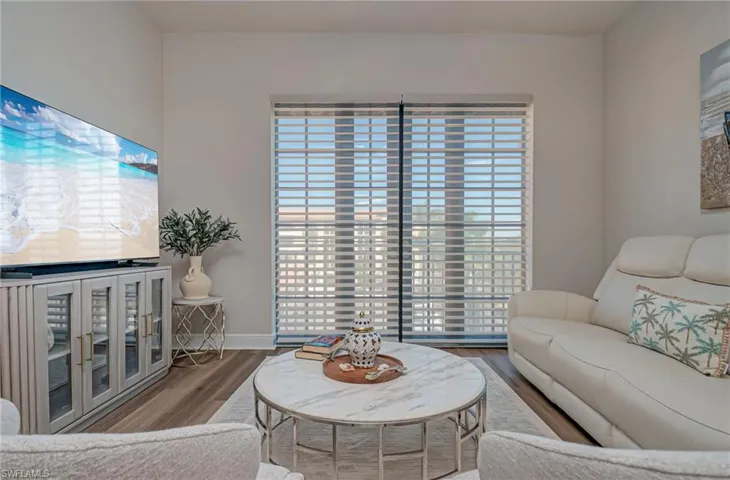 New furniture and comfortable sitting area to entertain- tons of natural light