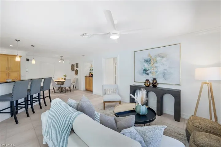 Family room off the kitchen and breakfast nook/wet bar.