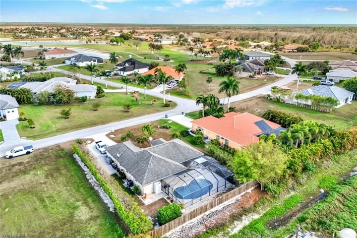 Aerial view of residential area and golfing.