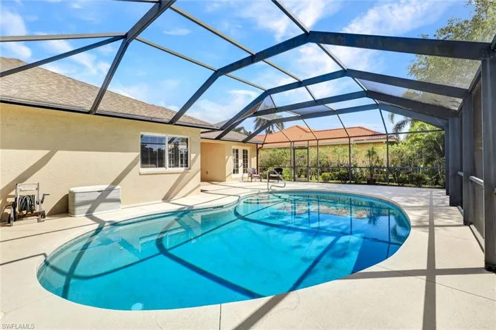 Screened lanai with pool.