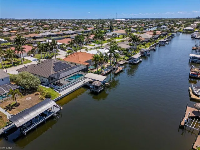 Bird's eye view with a water view. 150 ft wide canal. Watch the boats go by!