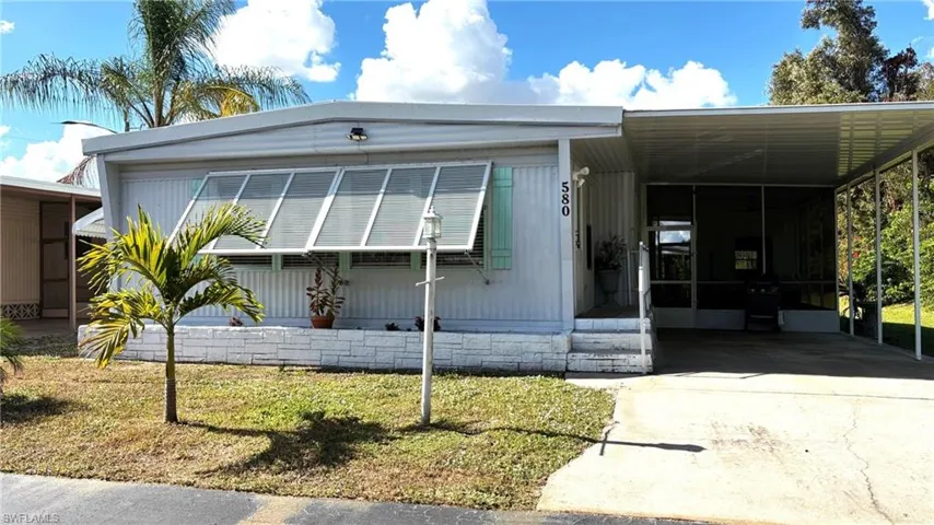 Meticulously maintained double-wide with 2 spacious Bedrooms and 2 remodeled FULL bathrooms with showers.