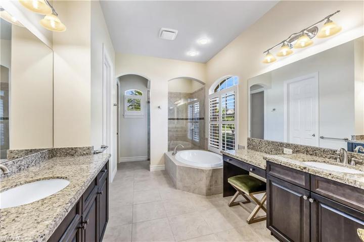 Primary Bathroom With Walk-In Shower and Soaking Tub