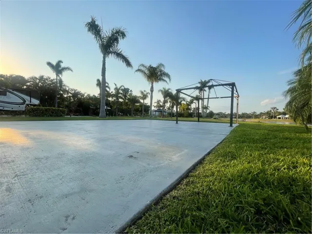 View of home's community featuring community basketball court