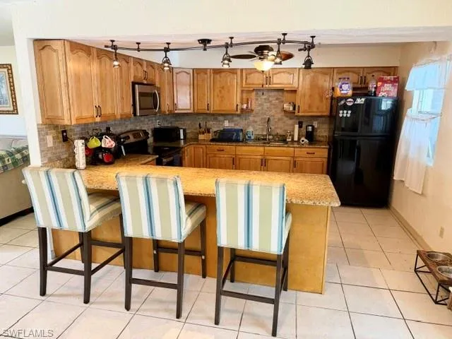 Gorgeous granite countertops and plenty of cabinet storage