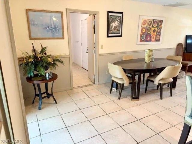 The lovely wainscoting and chair rail help protect the walls